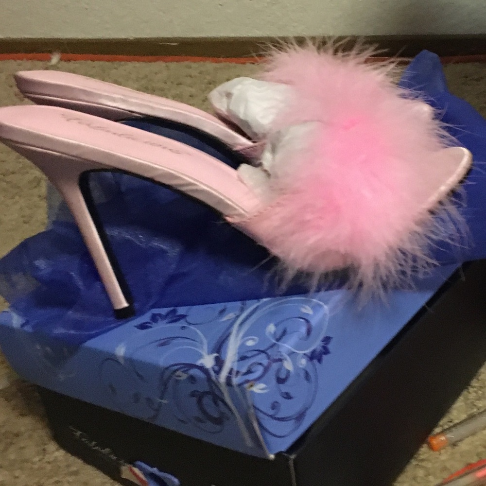Furry pink pumps